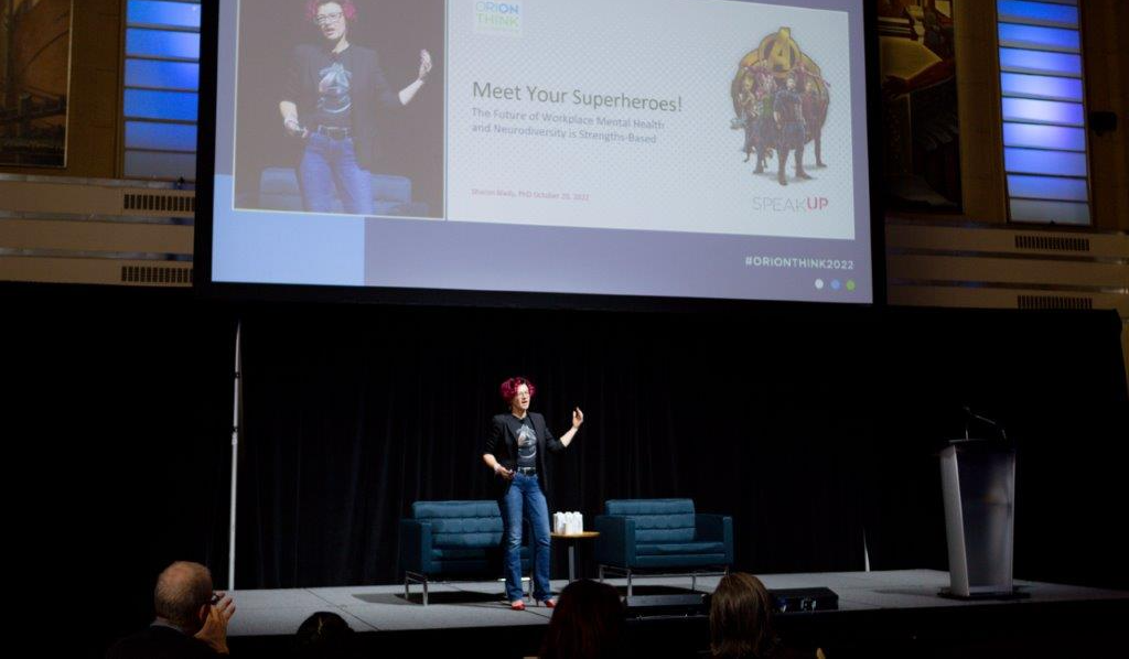 Image of Sharon Blady on stage delivering ORION THINK! 2020 Conference Keynote.
